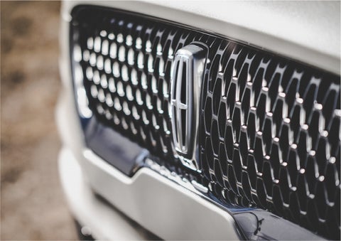 The grille of the 2023 Lincoln Aviator® Reserve model with an eye-catching repeated field of Lincoln Star logo shapes | Brinson Lincoln of Corsicana in Corsicana TX