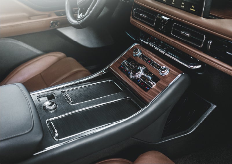 The front center console of a 2023 Lincoln Aviator® SUV is shown in | Brinson Lincoln of Corsicana in Corsicana TX