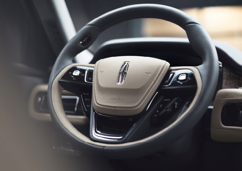 The intuitively placed controls of the steering wheel on a 2024 Lincoln Aviator® SUV | Brinson Lincoln of Corsicana in Corsicana TX
