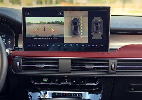 The driver of a 2024 Lincoln Corsair® SUV is shown selecting the drive mode. | Brinson Lincoln of Corsicana in Corsicana TX